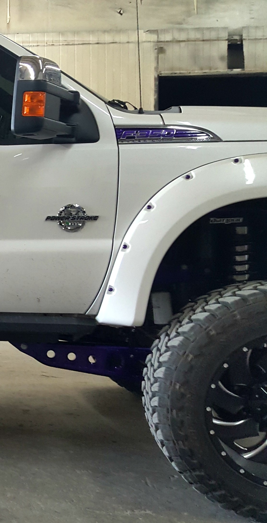 2016 Ford F250 custom paint logos rivets – Performance Truck Outfitters